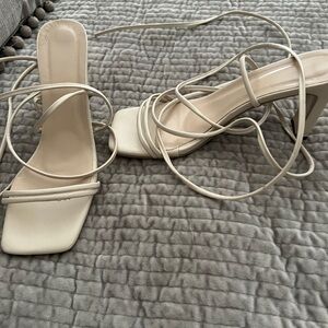 Sandals with heels and wrap around straps